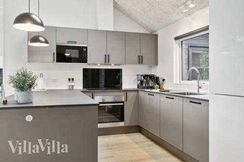 Kjøkkenet i luksushus nr. 644 er fullt utstyrt så dere lett kan lage mat til 14 personer.