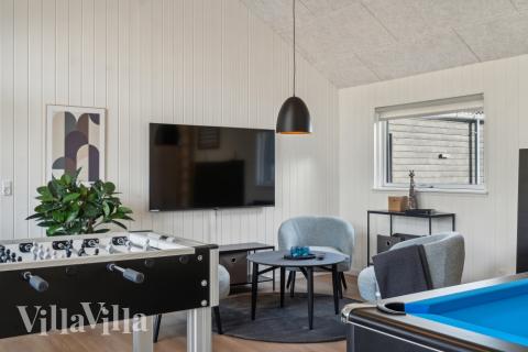 Konkurrer i feriehusets aktivitetsrom når dere besøker luksushus nr. 646 i Nordsjælland.