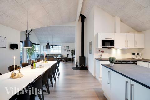 Oppholdsrom med plass til 18 i luksushus nr. 810.