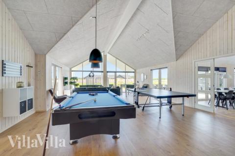 Konkurrer i feriehusets aktivitetsrom når dere besøker luksushus nr. 830 i Østjylland.