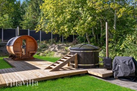 Luksushus nr. 674 har en deilig terrasse med gode hagemøbler til 26 personer.