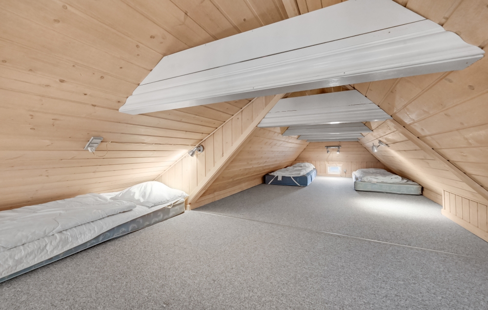 Noen av de 15 soveplassene i luksushus nr. 675 finnes på hems