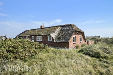 Dette lekre huset med svømmebasseng, nr. 675, med plass til 15 personer, ligger i Vestjylland