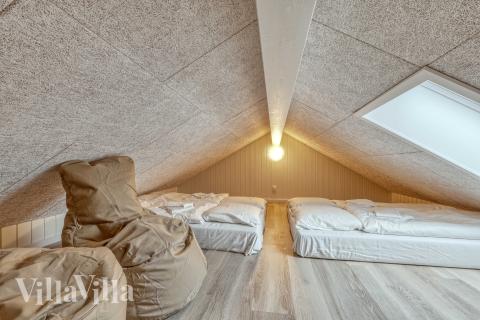 Noen av de 14 soveplassene i luksushus nr. 767 finnes på hems