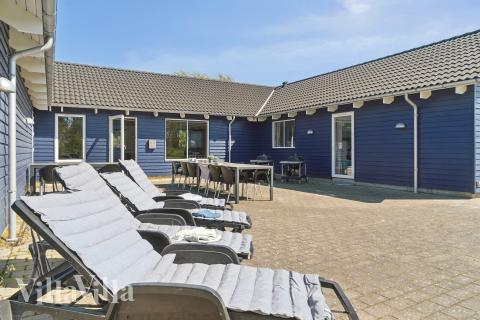 Nyt en grillkveld på terrassen i luksushus nr. 314 i Lolland/Falster/Møn