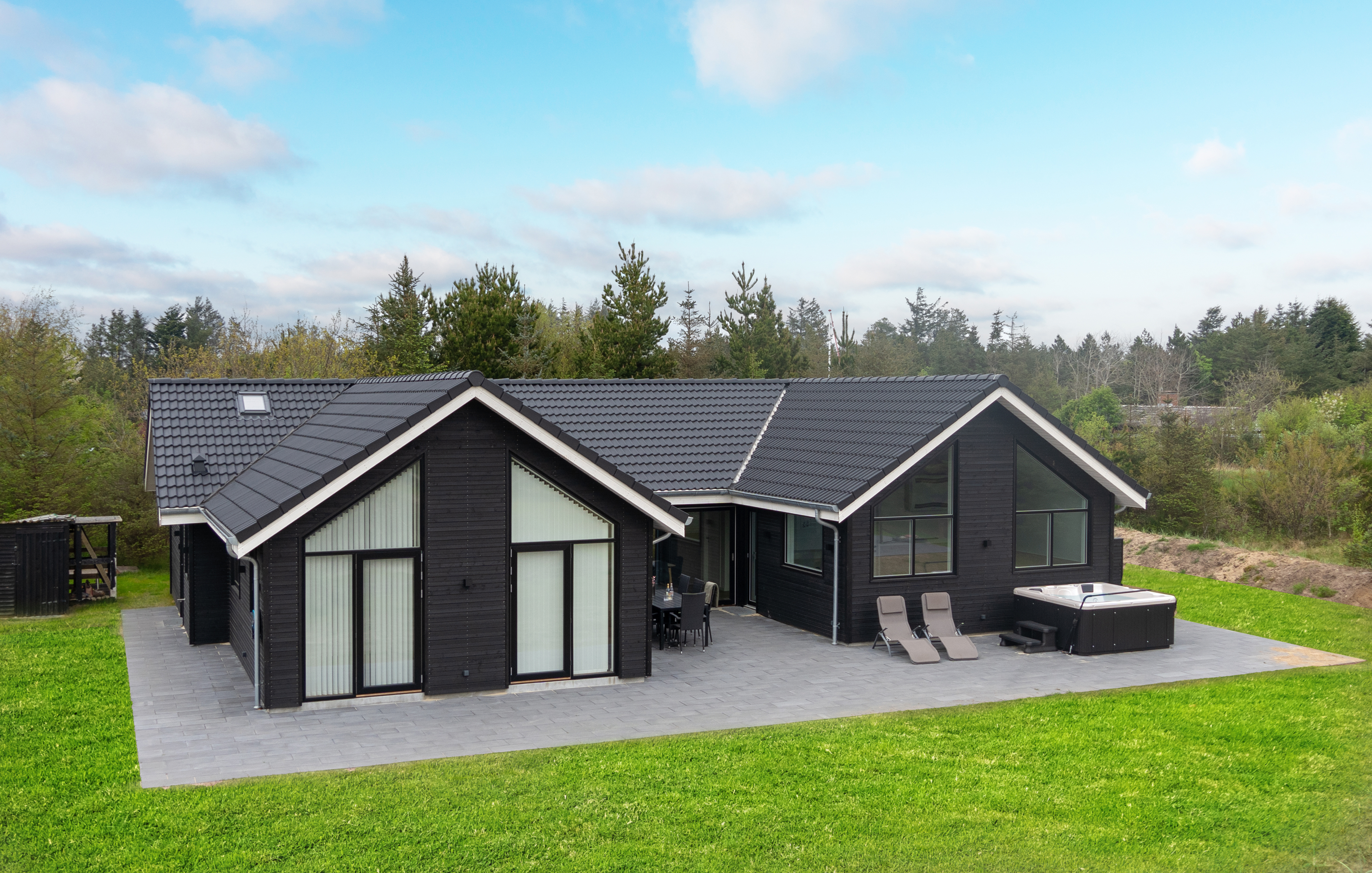 Dette lekre huset med svømmebasseng, nr. 692, med plass til 12 personer, ligger i Nordjylland