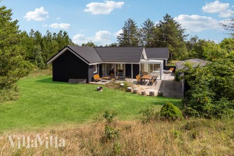 Dette lekre huset med spa, nr. 691, med plass til 10 personer, ligger i Nordjylland