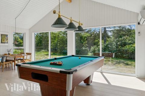I tillegg til alle aktivitetsmulighetene i husets bassengavdeling, kan du også spille biljard, bordtennis og dart i luksushus nr. 691