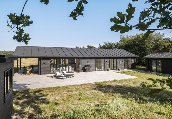 Dette lekre huset med spa, nr. 693, med plass til 11 personer, ligger i Nordsjælland