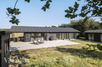 Dette lekre huset med spa, nr. 693, med plass til 11 personer, ligger i Nordsjælland