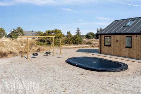 Dette lekre huset med svømmebasseng, nr. 660, med plass til 16 personer, ligger i Vestjylland