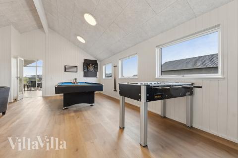 Konkurrer i feriehusets aktivitetsrom når dere besøker luksushus nr. 665 i Fyn og øyer.