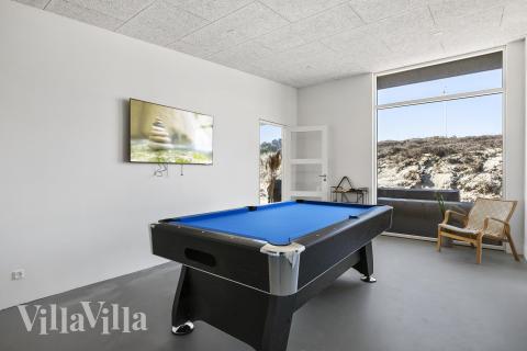 I tillegg til alle aktivitetsmulighetene i husets bassengavdeling, kan du også spille biljard, bordtennis og dart i luksushus nr. 687