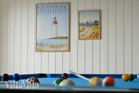 Konkurrer i feriehusets aktivitetsrom når dere besøker luksushus nr. 658 i Nordjylland.