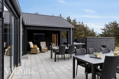 Luksushus nr. 658 har en deilig terrasse med gode hagemøbler til 20 personer.