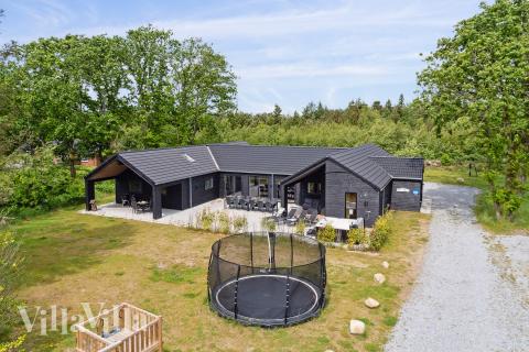 Dette lekre huset med svømmebasseng, nr. 627, med plass til 20 personer, ligger i Vestjylland