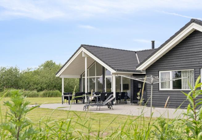 Dette lekre huset med svømmebasseng, nr. 459, med plass til 16 personer, ligger i Lolland/Falster/Møn