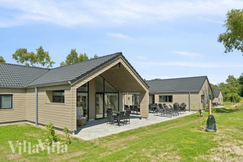 Dette lekre huset med svømmebasseng, nr. 807, med plass til 26 personer, ligger i Østjylland