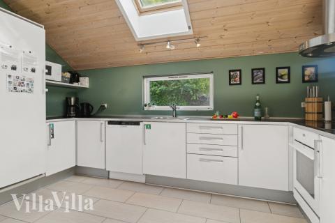 Kjøkkenet i luksushus nr. 268 er fullt utstyrt så dere lett kan lage mat til 14 personer.