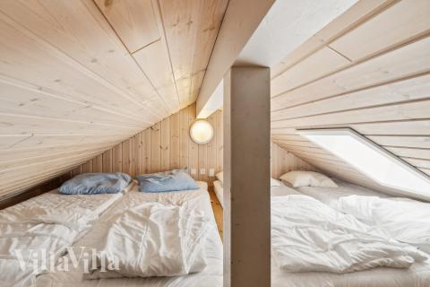 Noen av de 14 soveplassene i luksushus nr. 268 finnes på hems