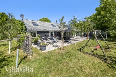 Dette lekre huset med svømmebasseng, nr. 339, med plass til 16 personer, ligger i Nordsjælland