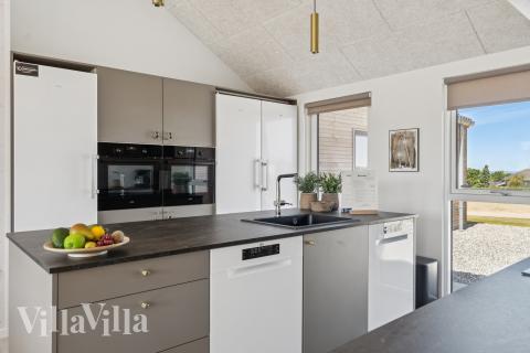 Kjøkkenet i luksushus nr. 671 er fullt utstyrt så dere lett kan lage mat til 20 personer.