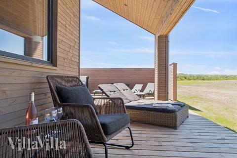 Nyt en grillkveld på terrassen i luksushus nr. 671 i Fyn og øyer