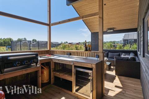 Stor terrasse i luksushus nr. 656 i Nordjylland.