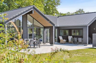 Dette lekre huset med svømmebasseng, nr. 644, med plass til 14 personer, ligger i Lolland/Falster/Møn