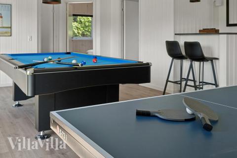 Konkurrer i feriehusets aktivitetsrom når dere besøker luksushus nr. 657 i Sydjylland.