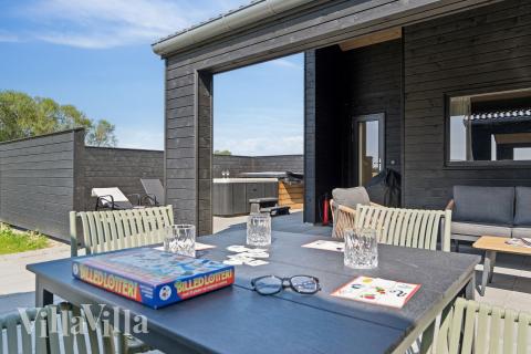 Nyt en grillkveld på terrassen i luksushus nr. 667 i Fyn og øyer