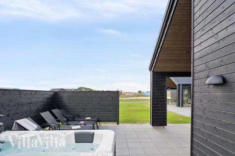 Nyt varmen i boblebadet i luksushus nr. 695 i Fyn og øyer