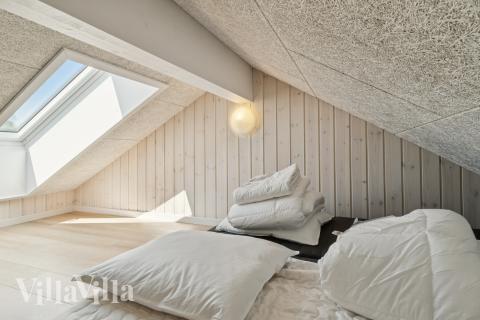 Noen av de 24 soveplassene i luksushus nr. 817 finnes på hems