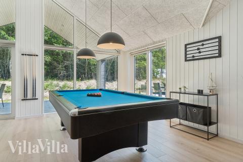 Konkurrer i feriehusets aktivitetsrom når dere besøker luksushus nr. 817 i Østjylland.