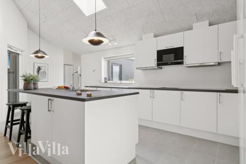 Kjøkkenet i luksushus nr. 817 er fullt utstyrt så dere lett kan lage mat til 24 personer.