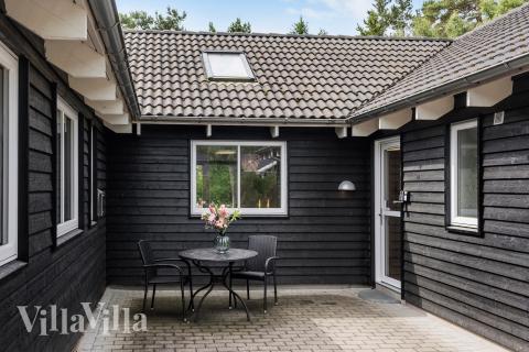 Nyt en grillkveld på terrassen i luksushus nr. 367 i Nordsjælland