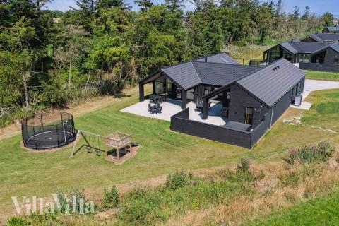 Dette lekre huset med svømmebasseng, nr. 616, med plass til 16 personer, ligger i Fyn og øyer