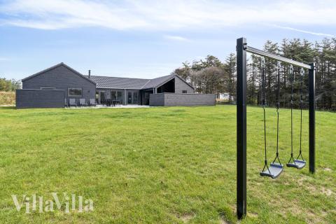 Dette lekre huset med svømmebasseng, nr. 658, med plass til 20 personer, ligger i Nordjylland