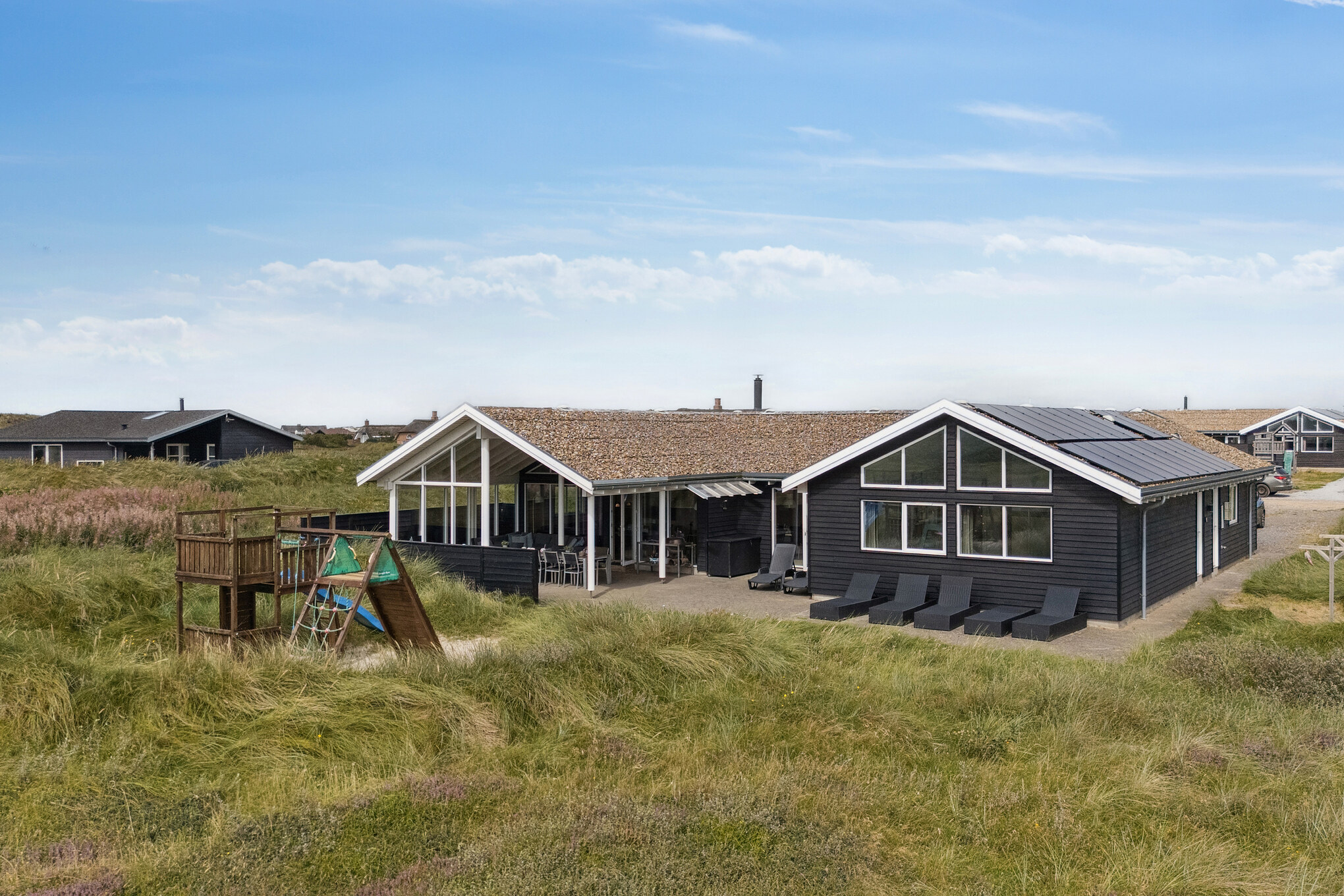Dette lekre huset med svømmebasseng, nr. 292, med plass til 18 personer, ligger i Vestjylland