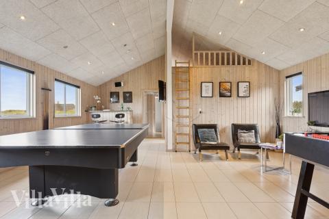 I tillegg til alle aktivitetsmulighetene i husets bassengavdeling, kan du også spille biljard, bordtennis og dart i luksushus nr. 292