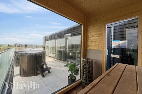 Nyt varmen i badstuen i luksushus nr. 686 til 36 personer