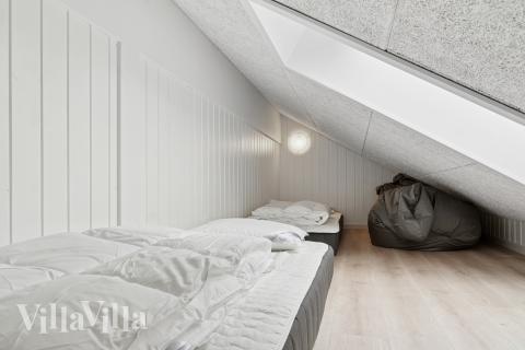 Noen av de 20 soveplassene i luksushus nr. 697 finnes på hems