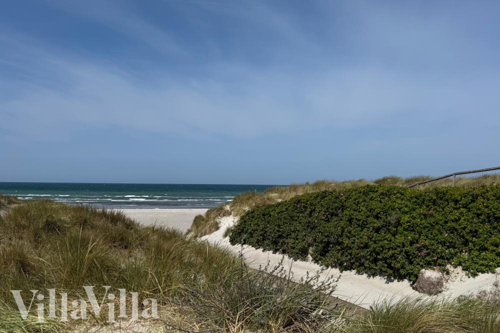 Stranden nær luksushus nr. 911.