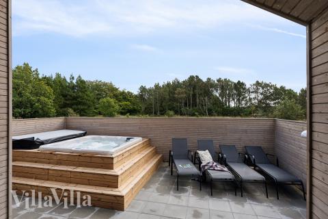 Nyt varmen i boblebadet i luksushus nr. 699 i Nordjylland