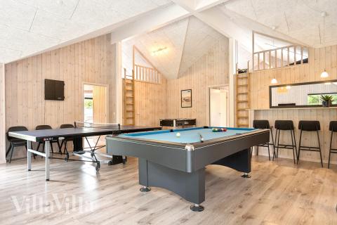 I tillegg til alle aktivitetsmulighetene i husets bassengavdeling, kan du også spille biljard, bordtennis og dart i luksushus nr. 387