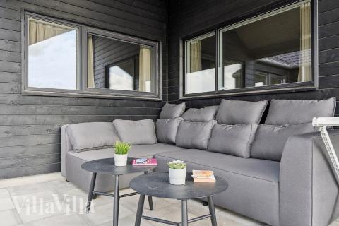 Nyt en grillkveld på terrassen i luksushus nr. 655 i Fyn og øyer