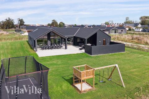 Dette lekre huset med svømmebasseng, nr. 655, med plass til 14 personer, ligger i Fyn og øyer