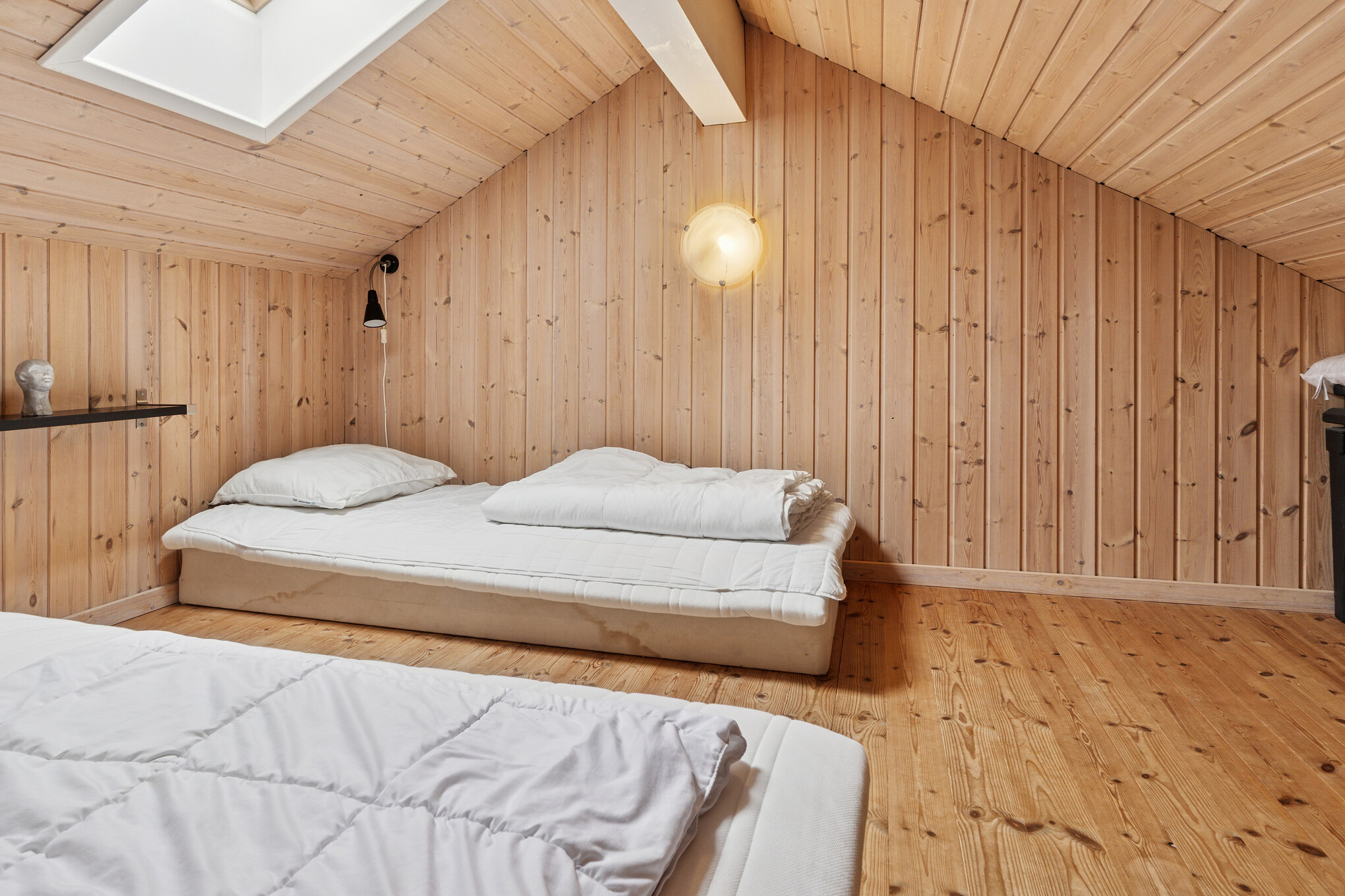 Noen av de 18 soveplassene i luksushus nr. 222 finnes på hems