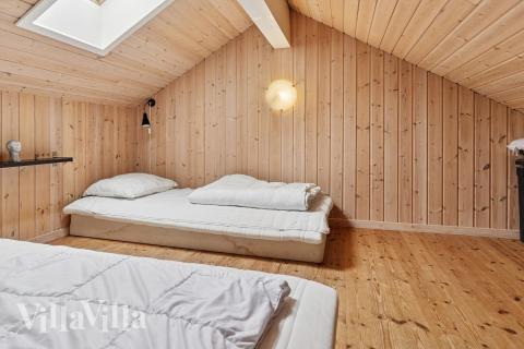 Noen av de 18 soveplassene i luksushus nr. 222 finnes på hems