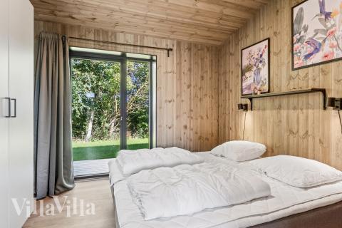 Et av de 5 soverommene i luksushus nr. 925 i Limfjorden.